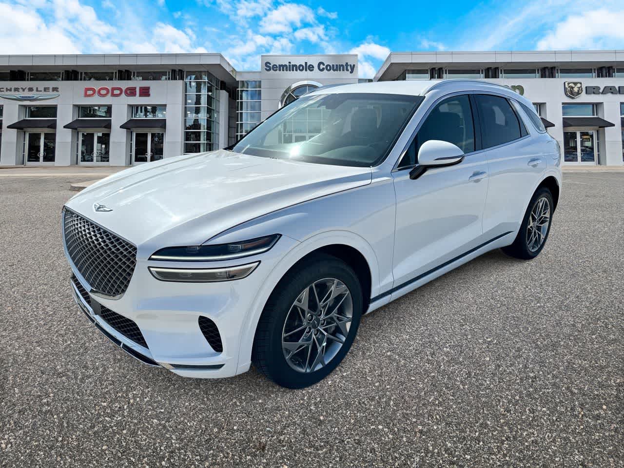 2025 Genesis GV70 2.5T AWD in Uyuni White — front three-quarter view